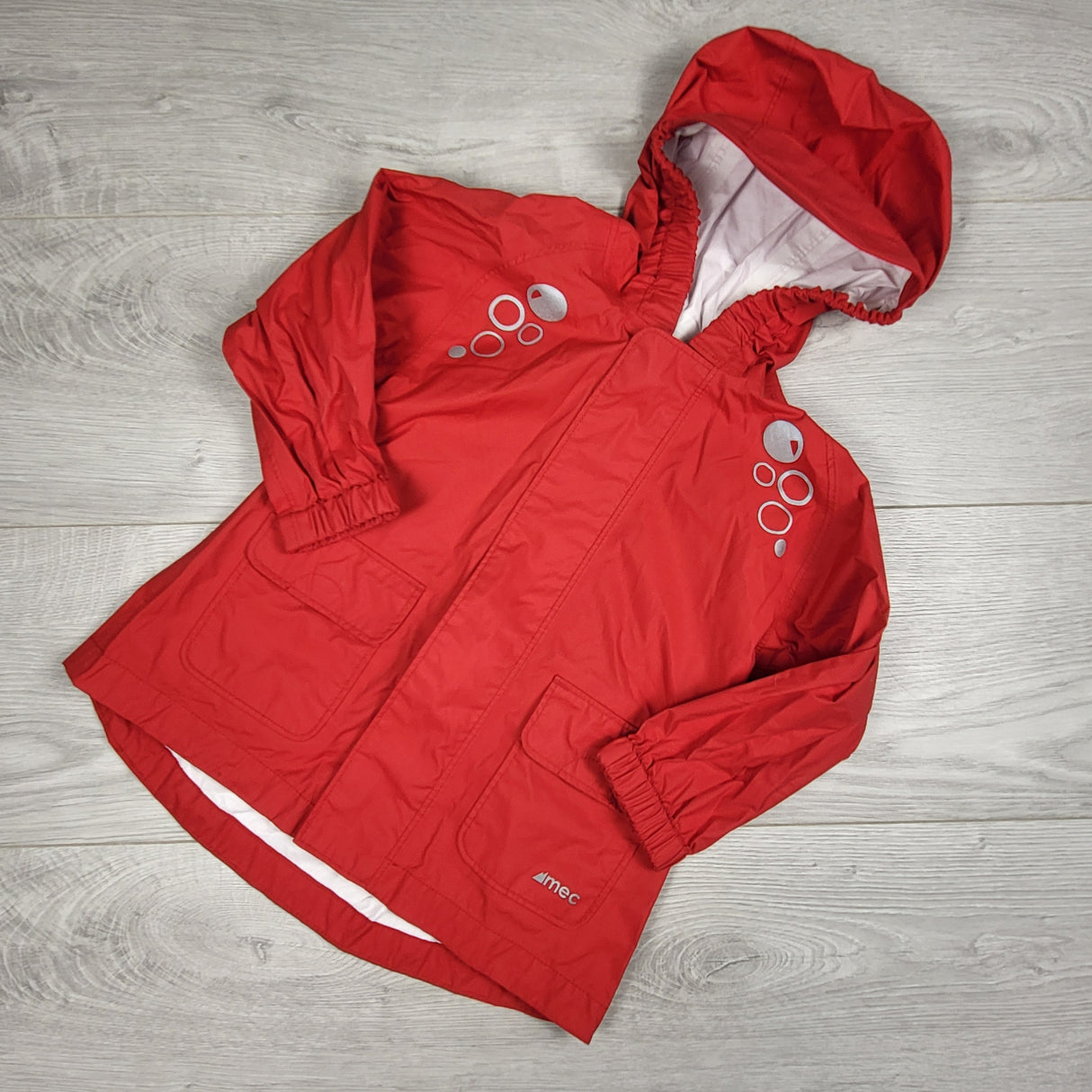 MEC red Cloudburst hooded rain jacket. Size 18 months