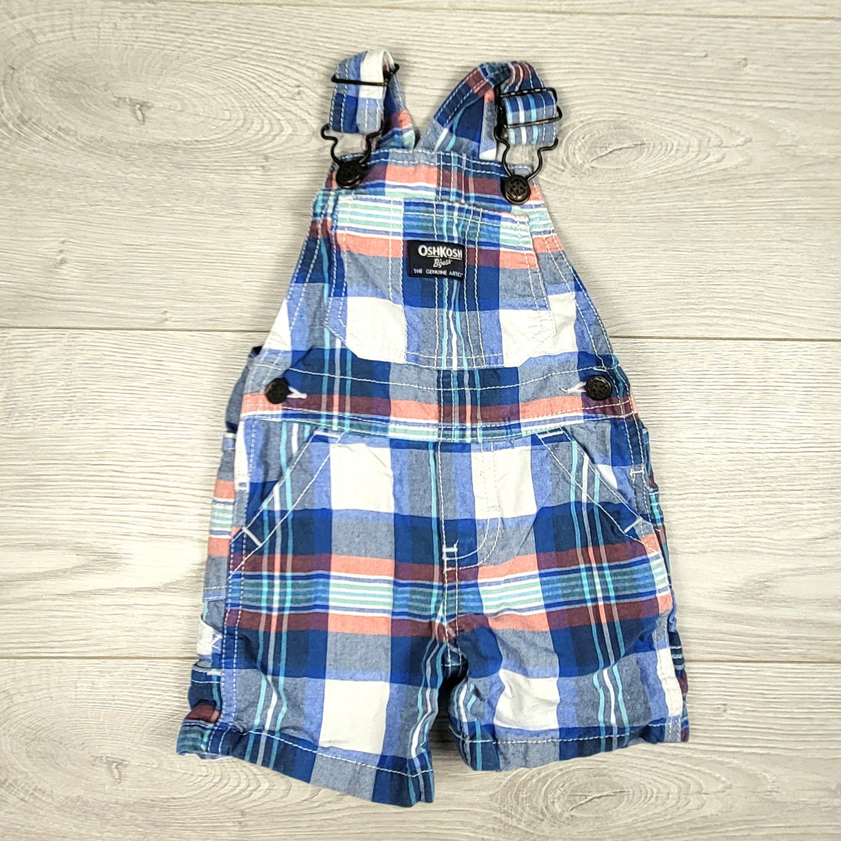 Oshkosh blue plaid shortalls. Size 9 months