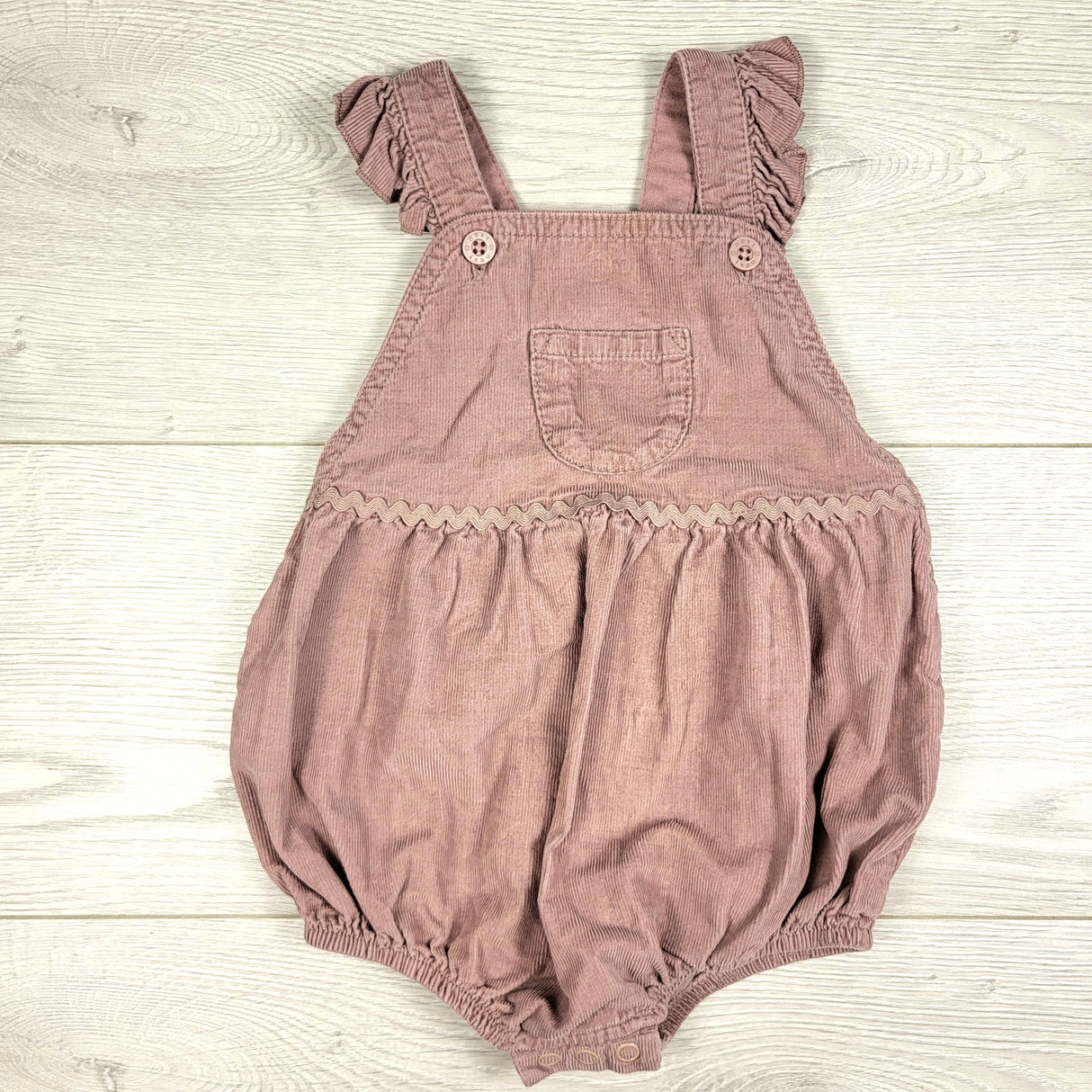 Next pink cordoroy bubble romper. Size 9-12 months