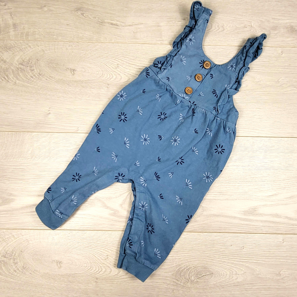 Carters blue floral print overalls. Size 6 months