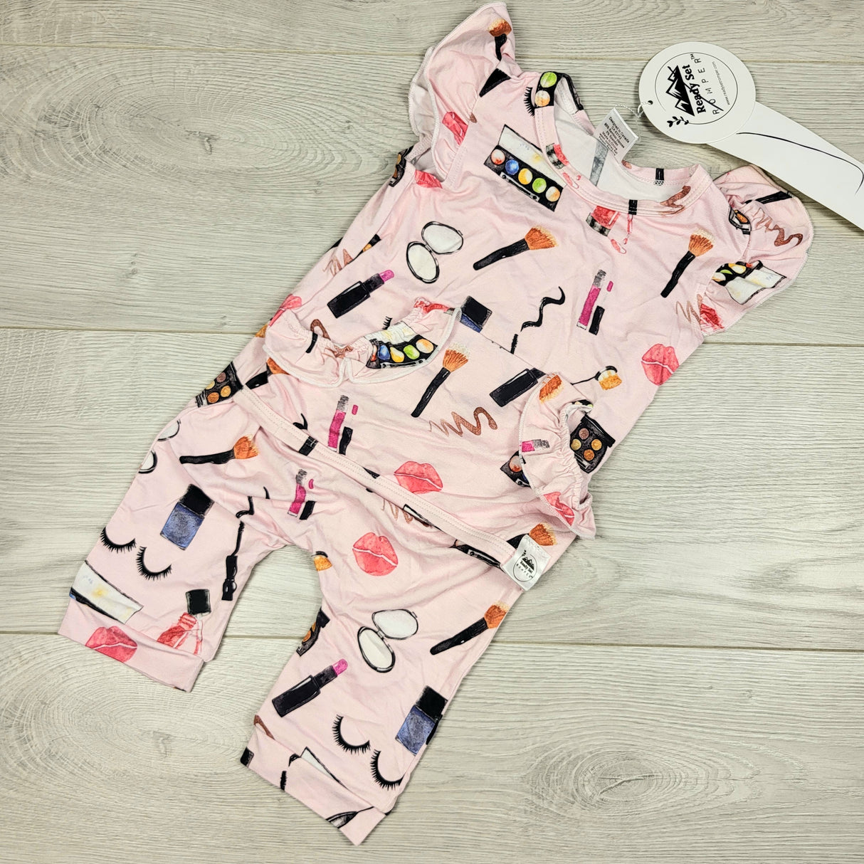 NEW- Ready Set Romper pink patterned bamboo romper. Size 6-12 months