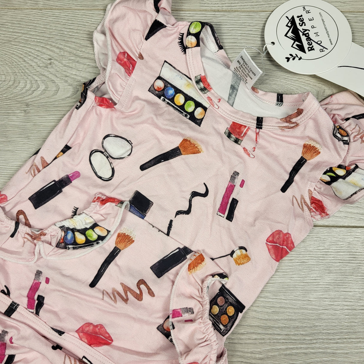 NEW- Ready Set Romper pink patterned bamboo romper. Size 6-12 months