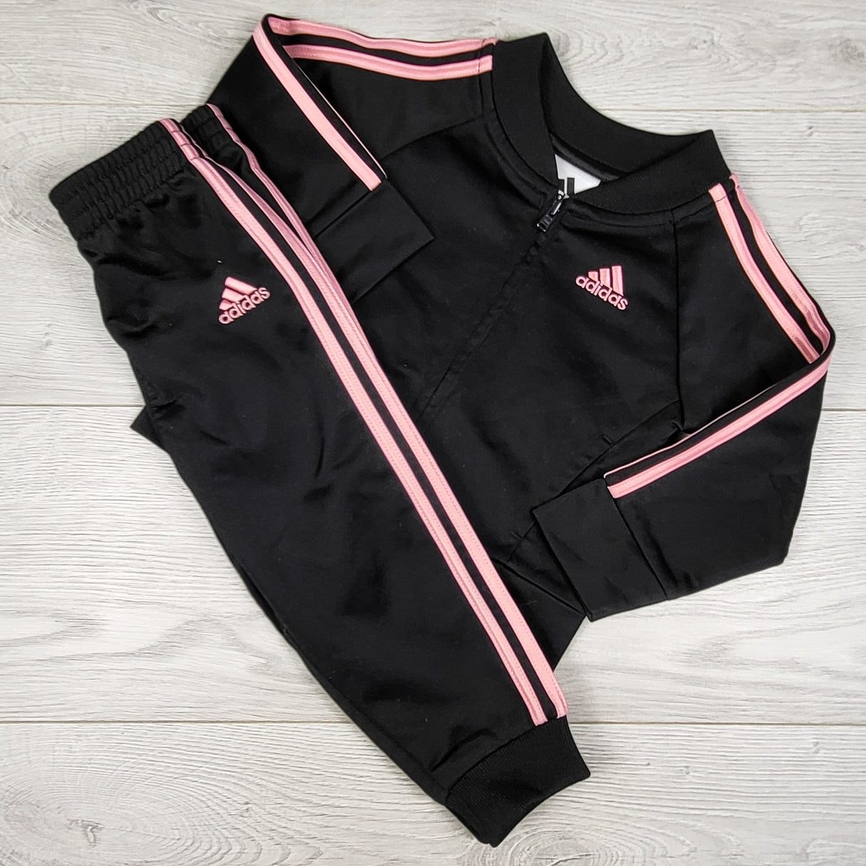 Adidas black and pink 2pc track suit. Size 18 months