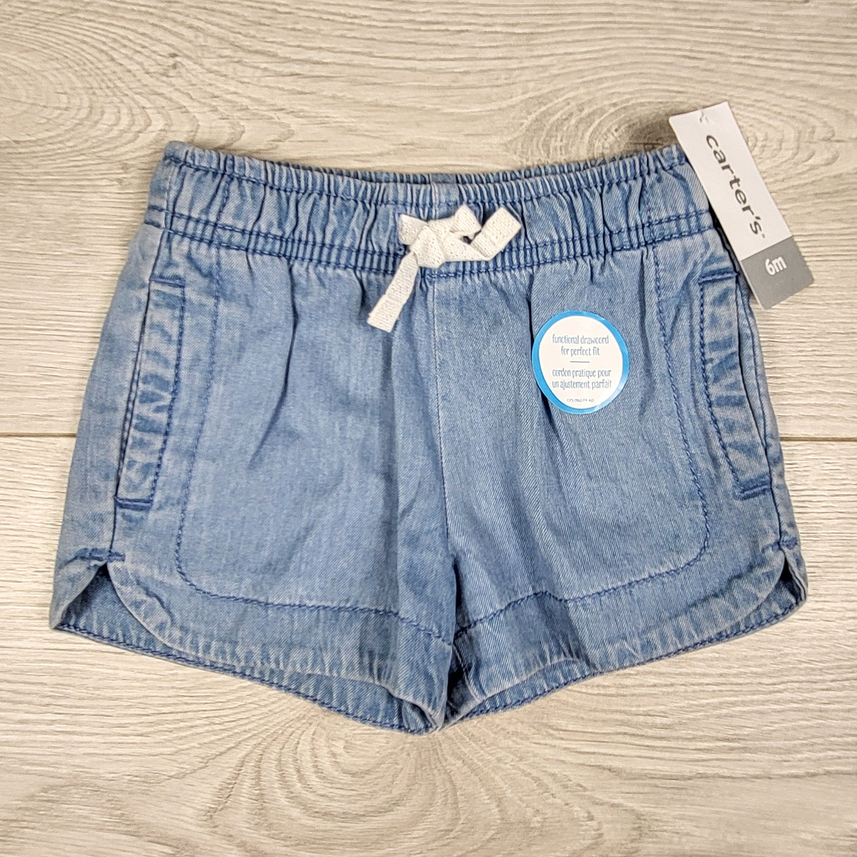 NEW - Carters denim look drawstring shorts. Size 6 months