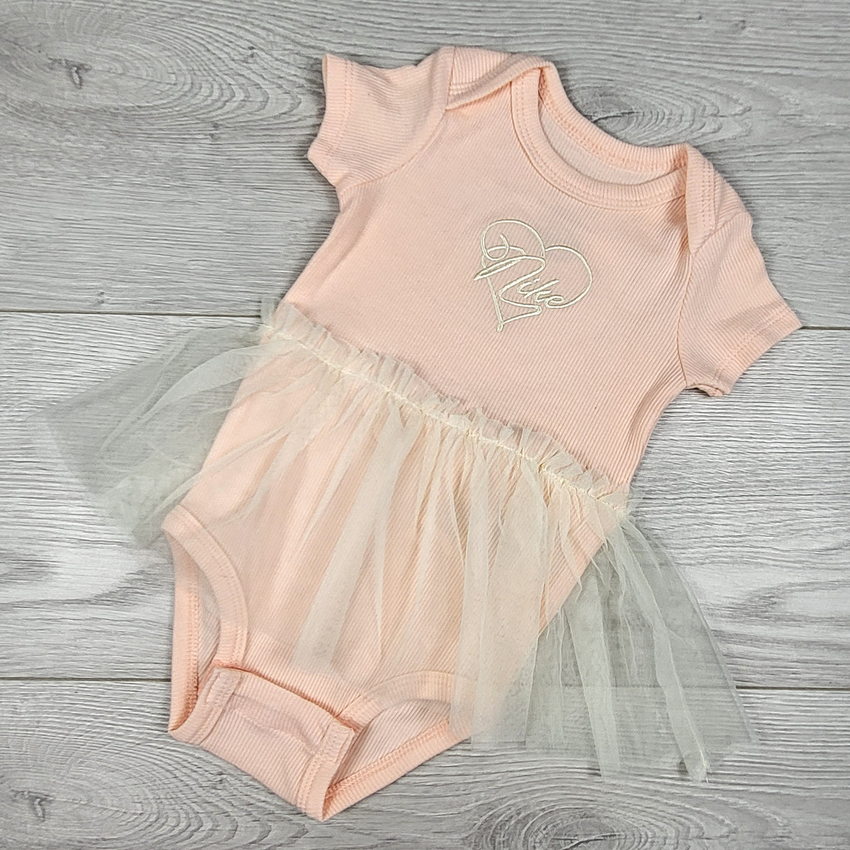 Nike pink tutu bodysuit. Size 0-6 months