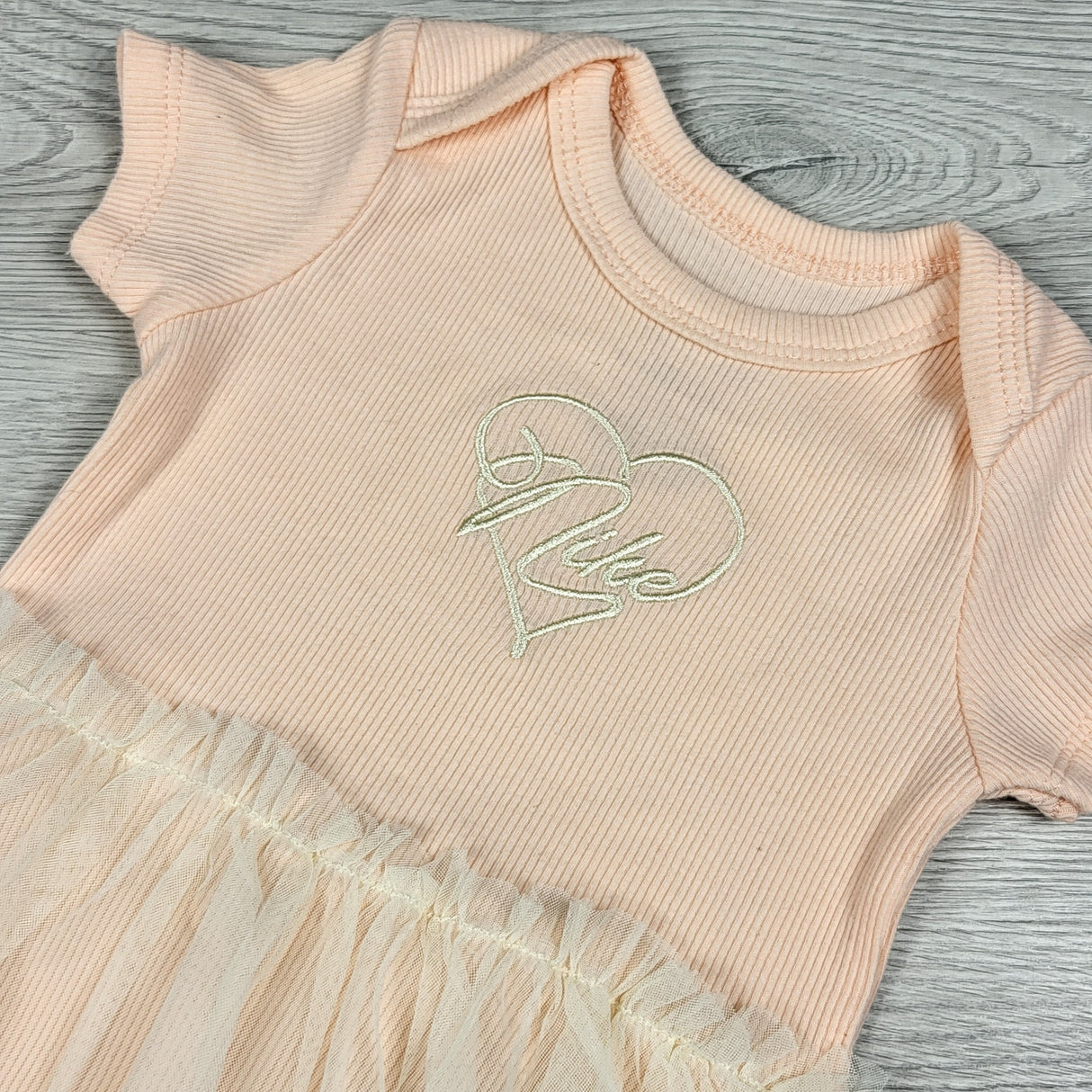 Nike pink tutu bodysuit. Size 0-6 months