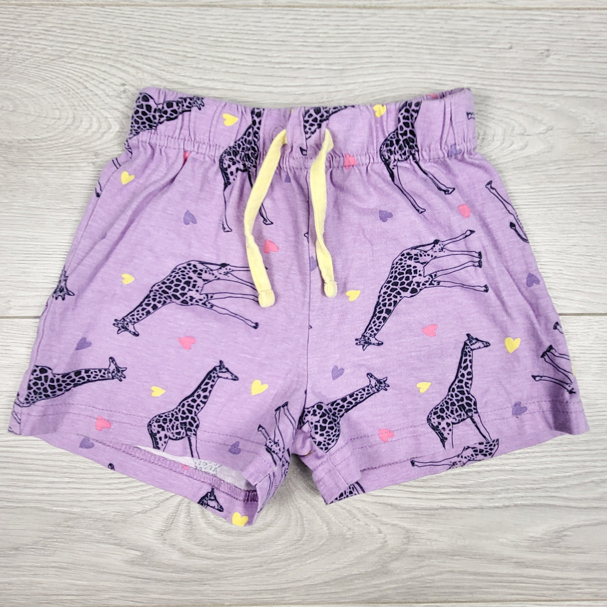 Dunnes purple giraffe print drawstring shorts. Size 3/4T