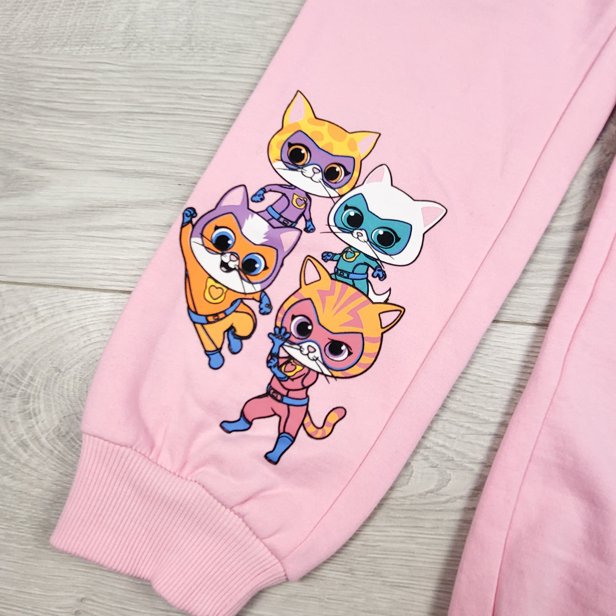 Disney Super Kitties pink fleecy lined sweatpants. Size 6/7