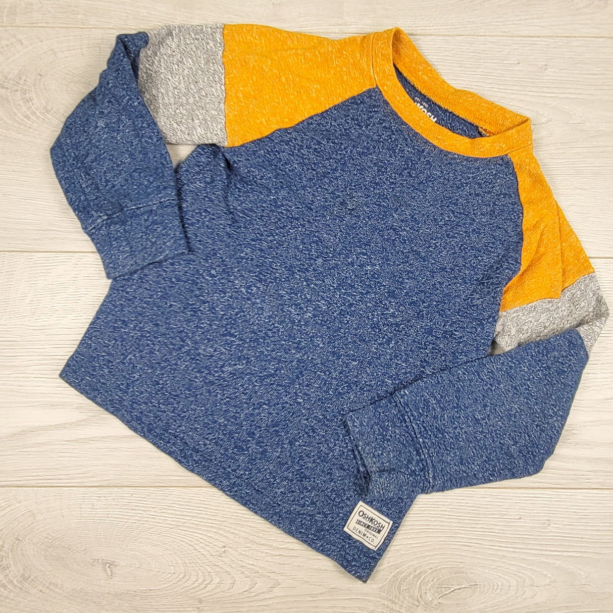 Oshkosh blue and yellow knit top. Size 4T