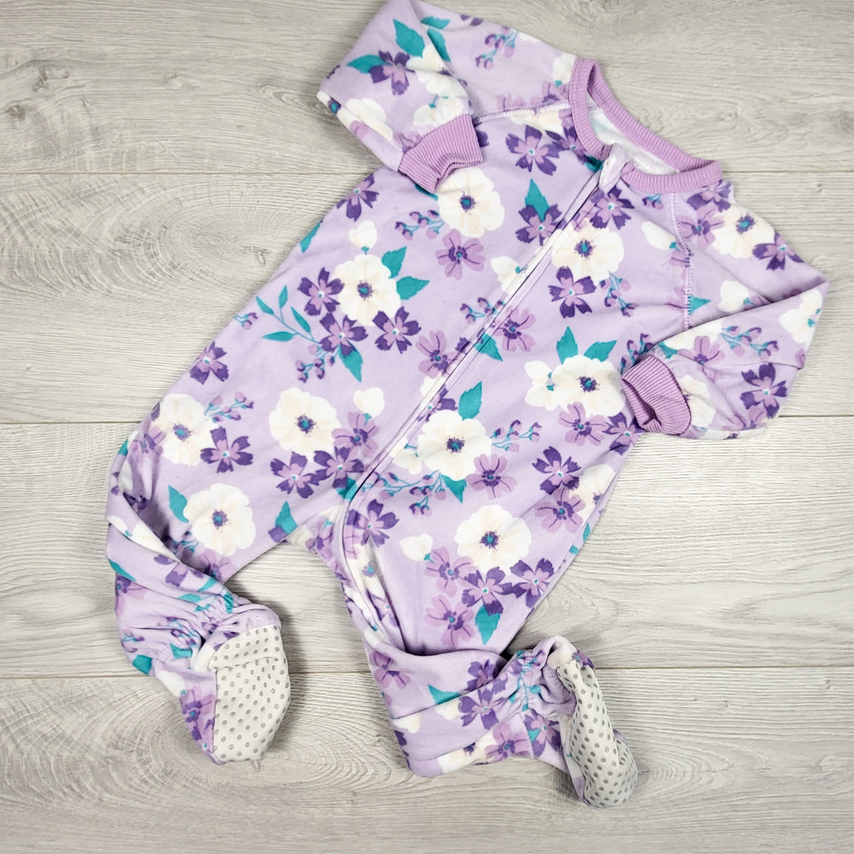 Carters purple floral print zippered fleece sleeper. Size 9-12 months