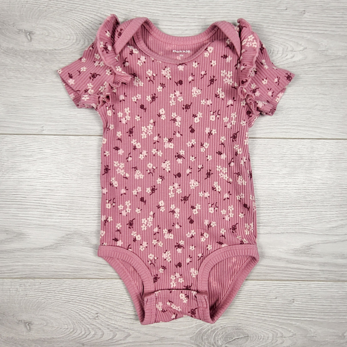 Pekkle pink ribbed floral print ruffle bodysuit. Size 6 months