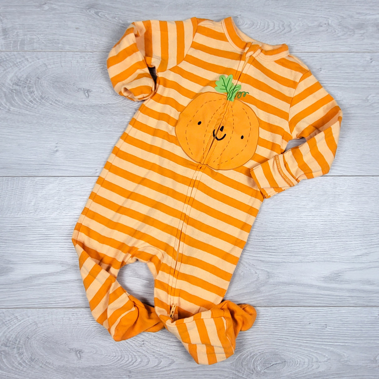 Old Navy striped sleeper with pumpkin. Size 6-9 months