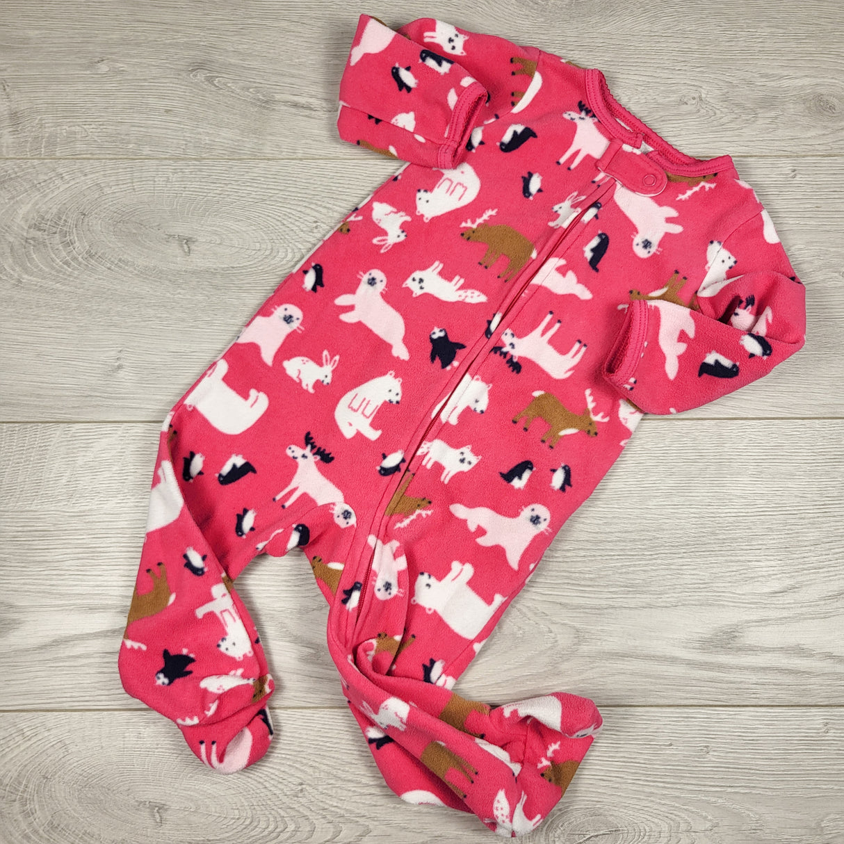 Carters pink zippered fleece sleeper with animals. Size 9 months