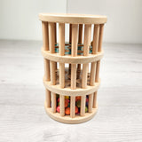B. Toys "A-Maze Rush Rain" wooden rolling tower toy (sorry. no shipping)
