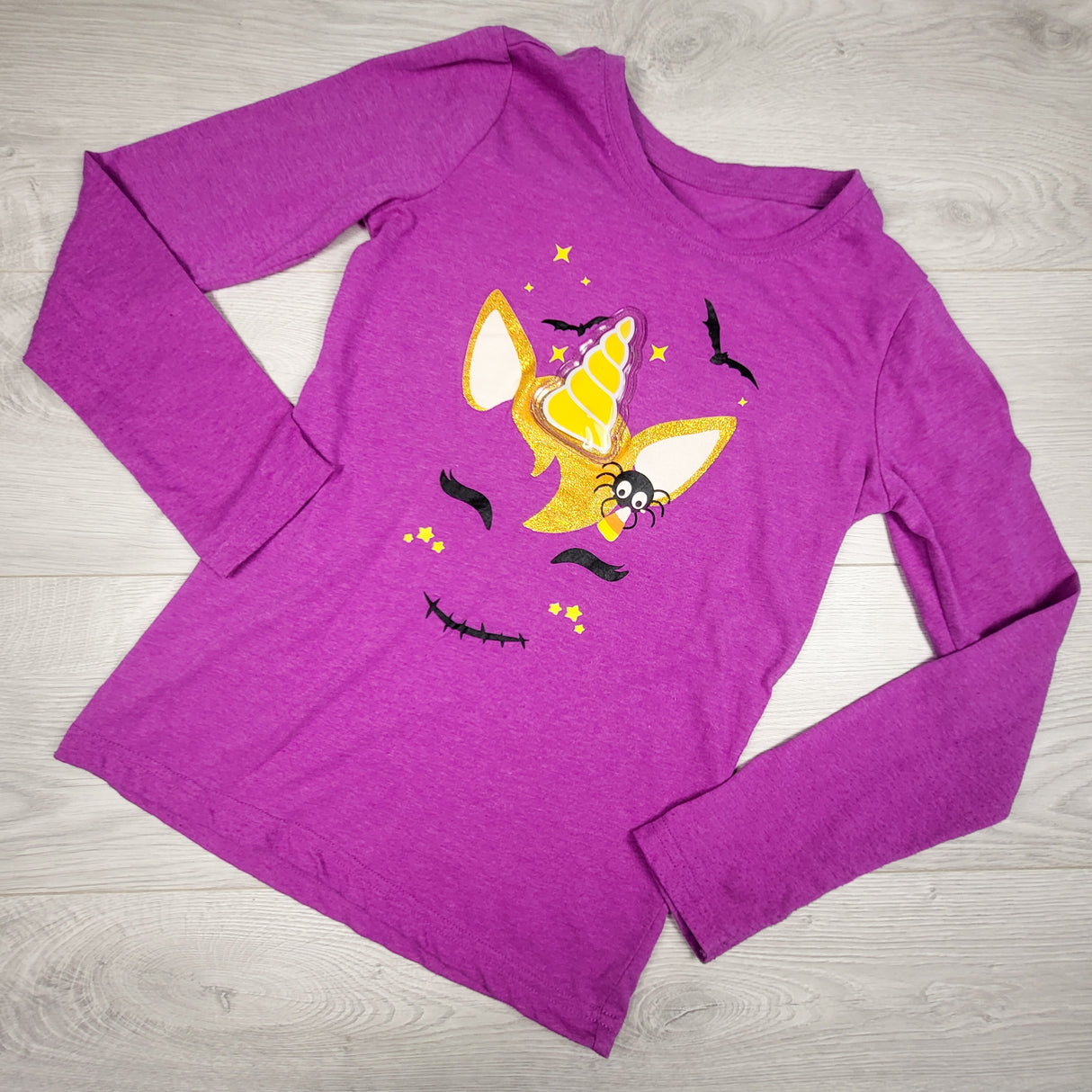 George purple unicorn top with light up horn. Size 10/12