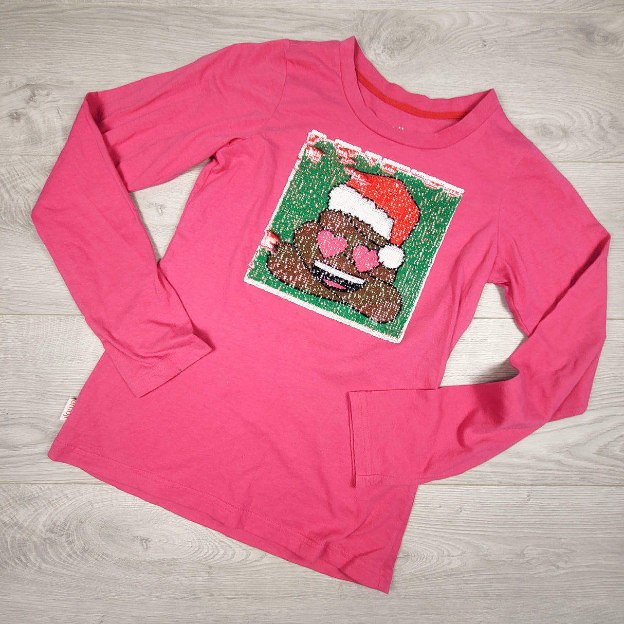 Emoji brand pink top with flip sequin emoji. Size 14/16