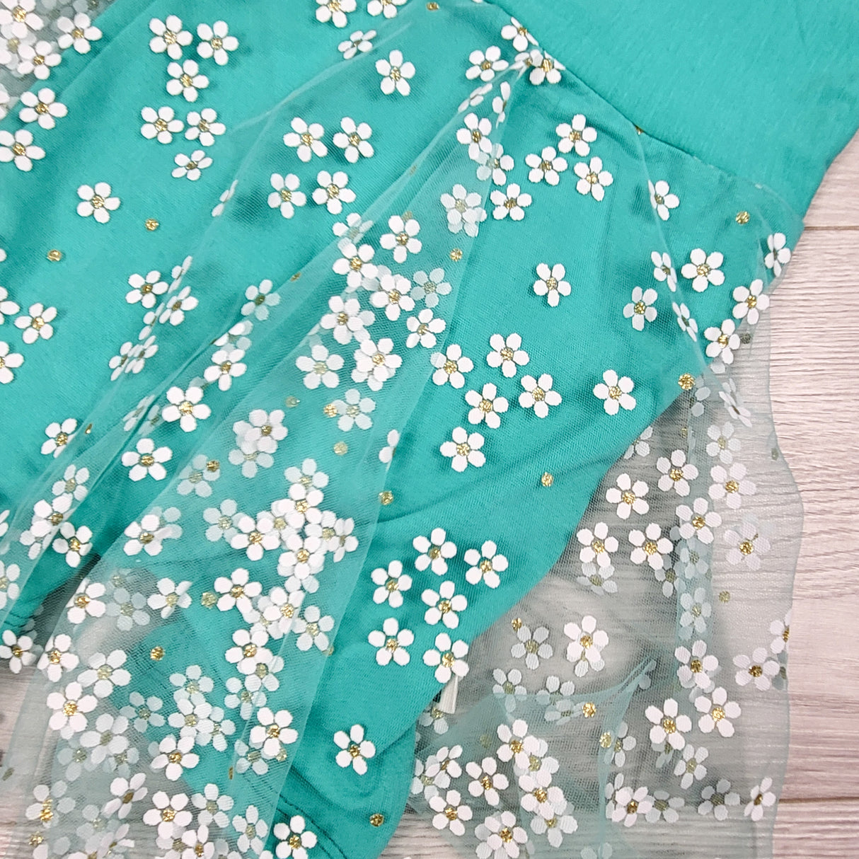 NWOT - Teddy Little Apparel teal romper with floral skirting. Size 4T