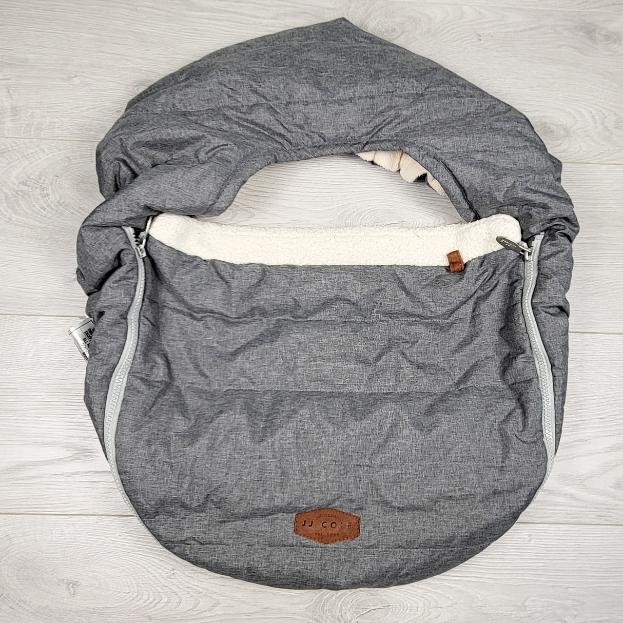 JJ Cole grey winter infant car seat cover.