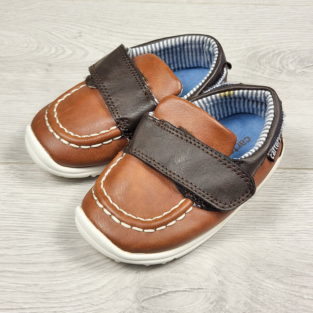 Carters brown slip-on boat shoes. Size 4.5 (infant)