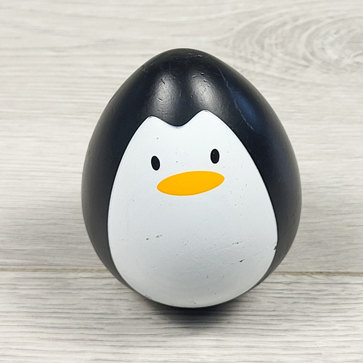 Plan Toys wooden penguin wobbler toy