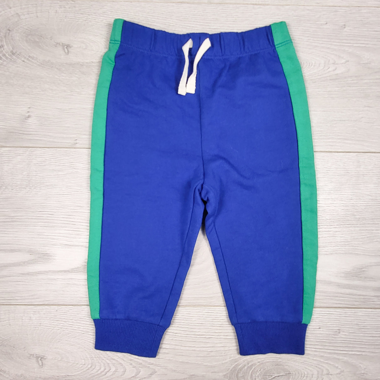 Joe blue joggers with green side stripe. Size 6-12 months