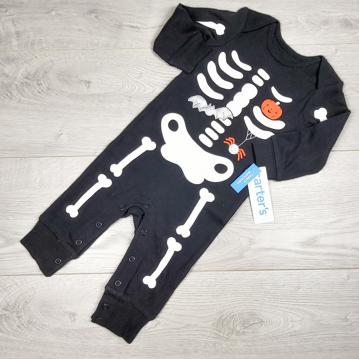NEW - Carters black skeleton sleeper. Size 6 months