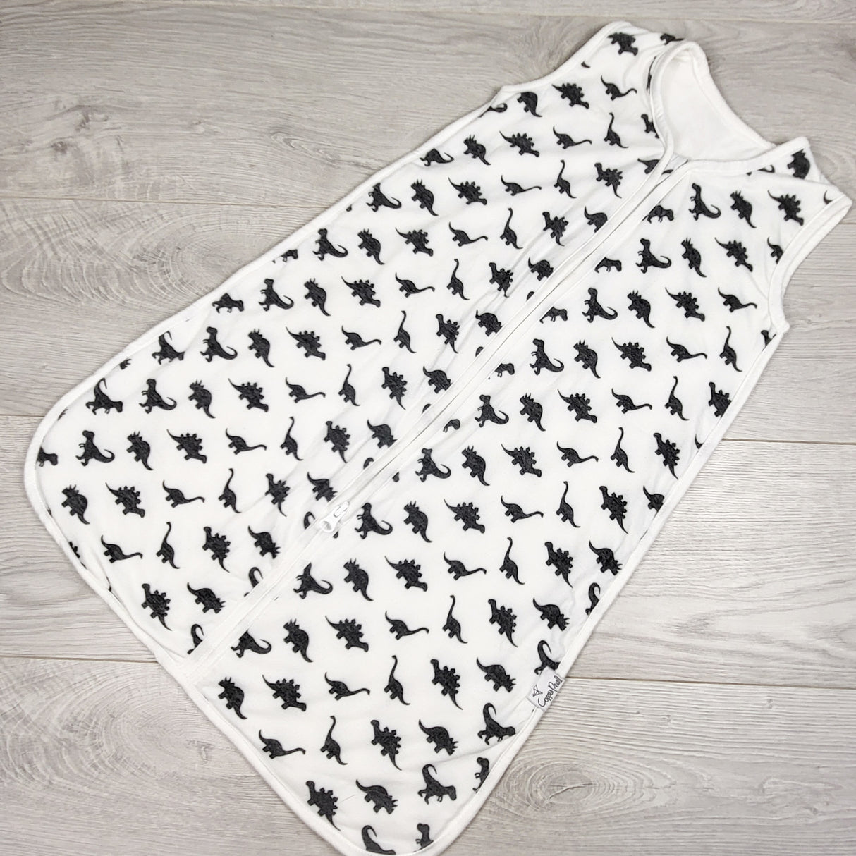 Copper Pearl premium dinosaur print sleep sack. Size 0-6 months
