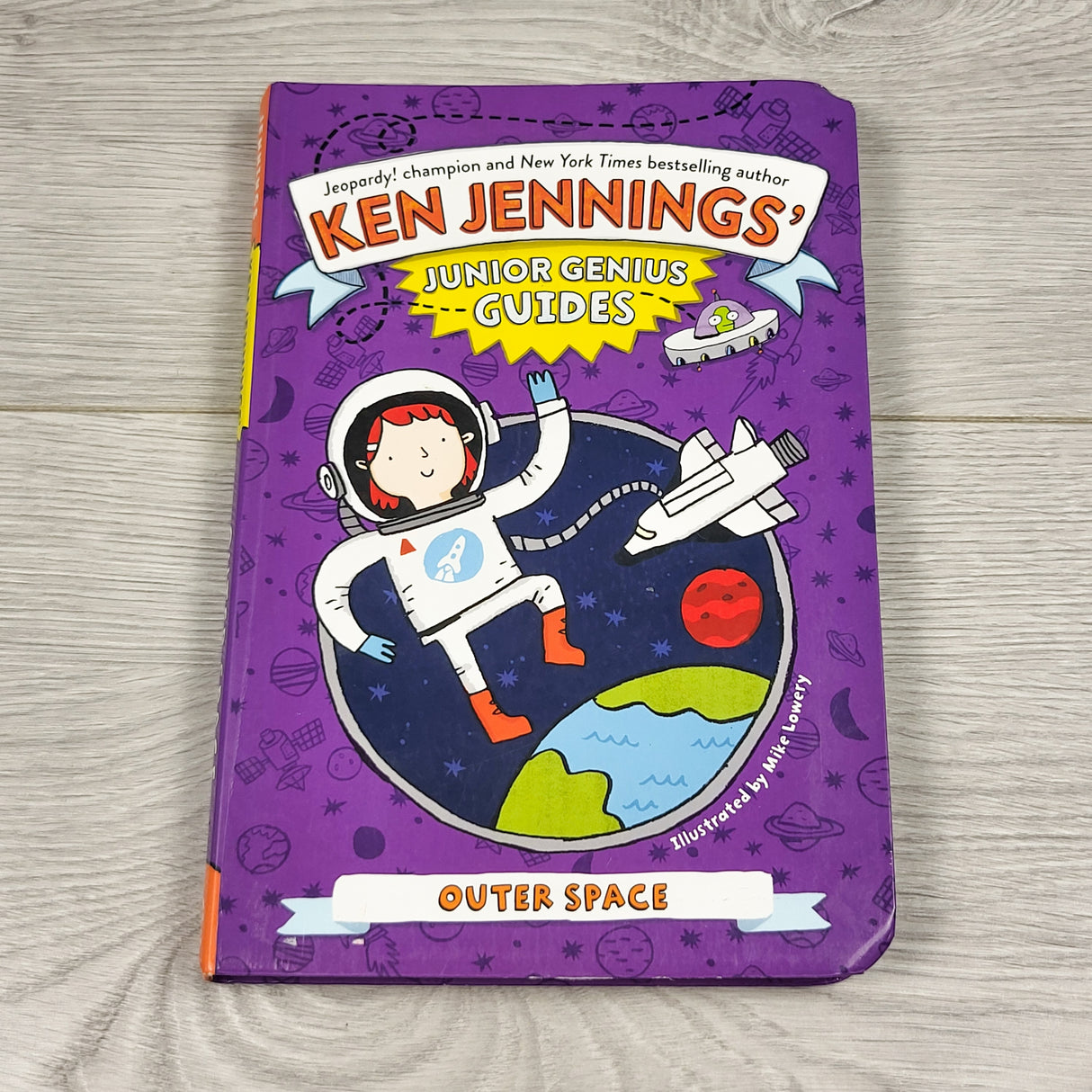 Junior Genius Guides: Outer Space. Soft cover book