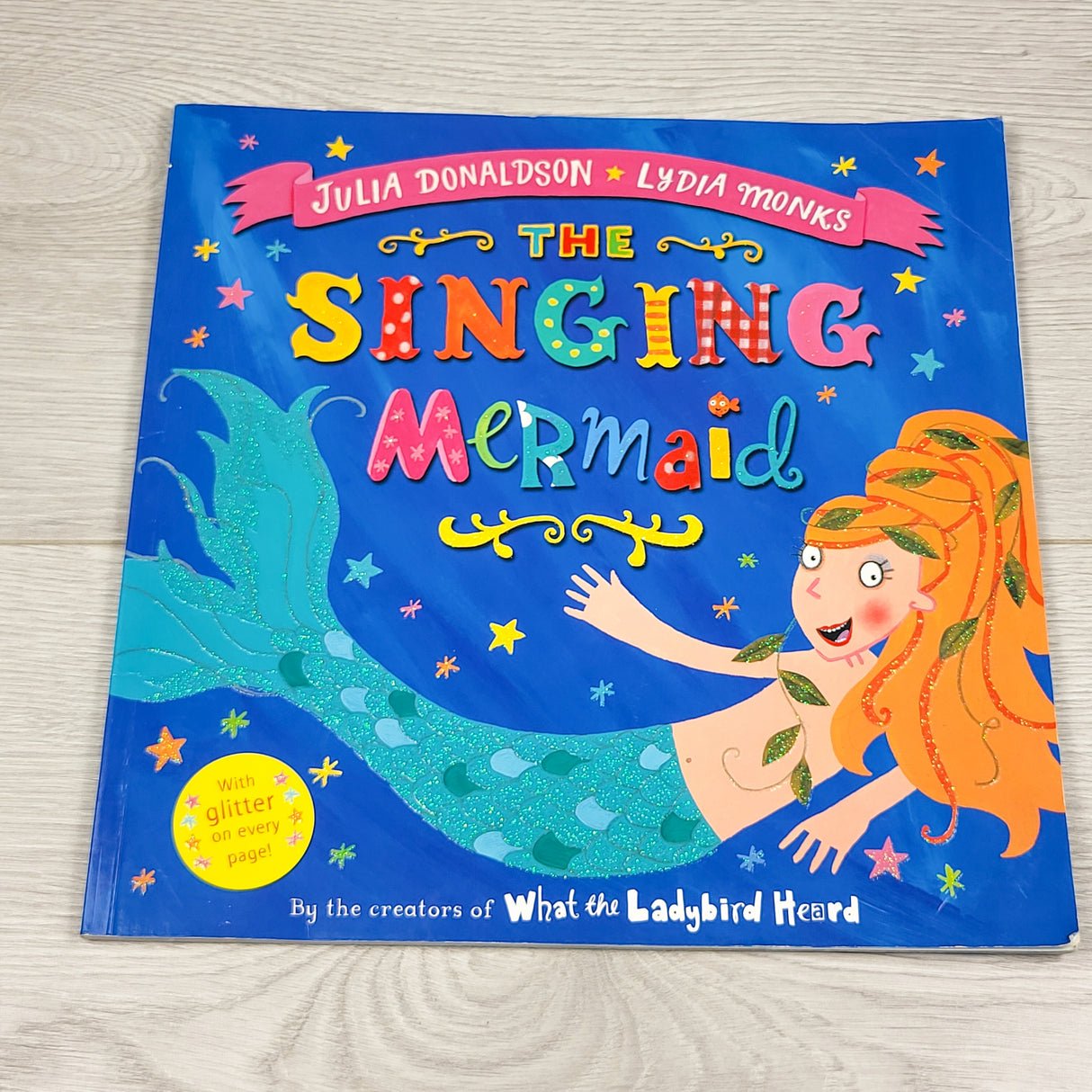 The Singing Mermaid. Soft cover book