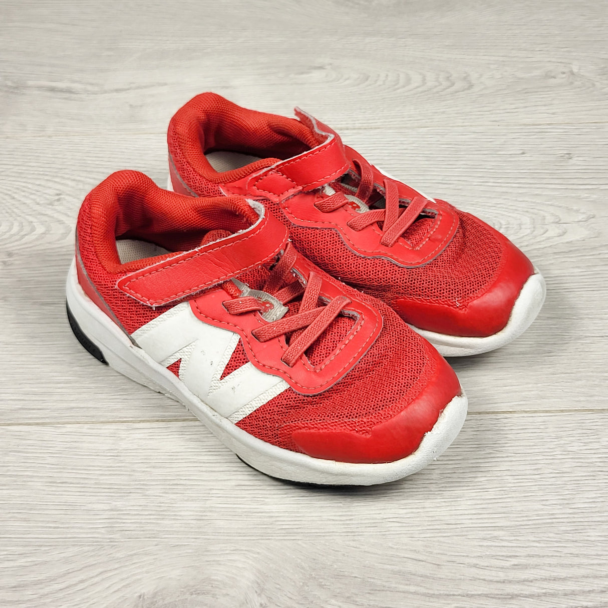 New Balance red running shoes. Size 10