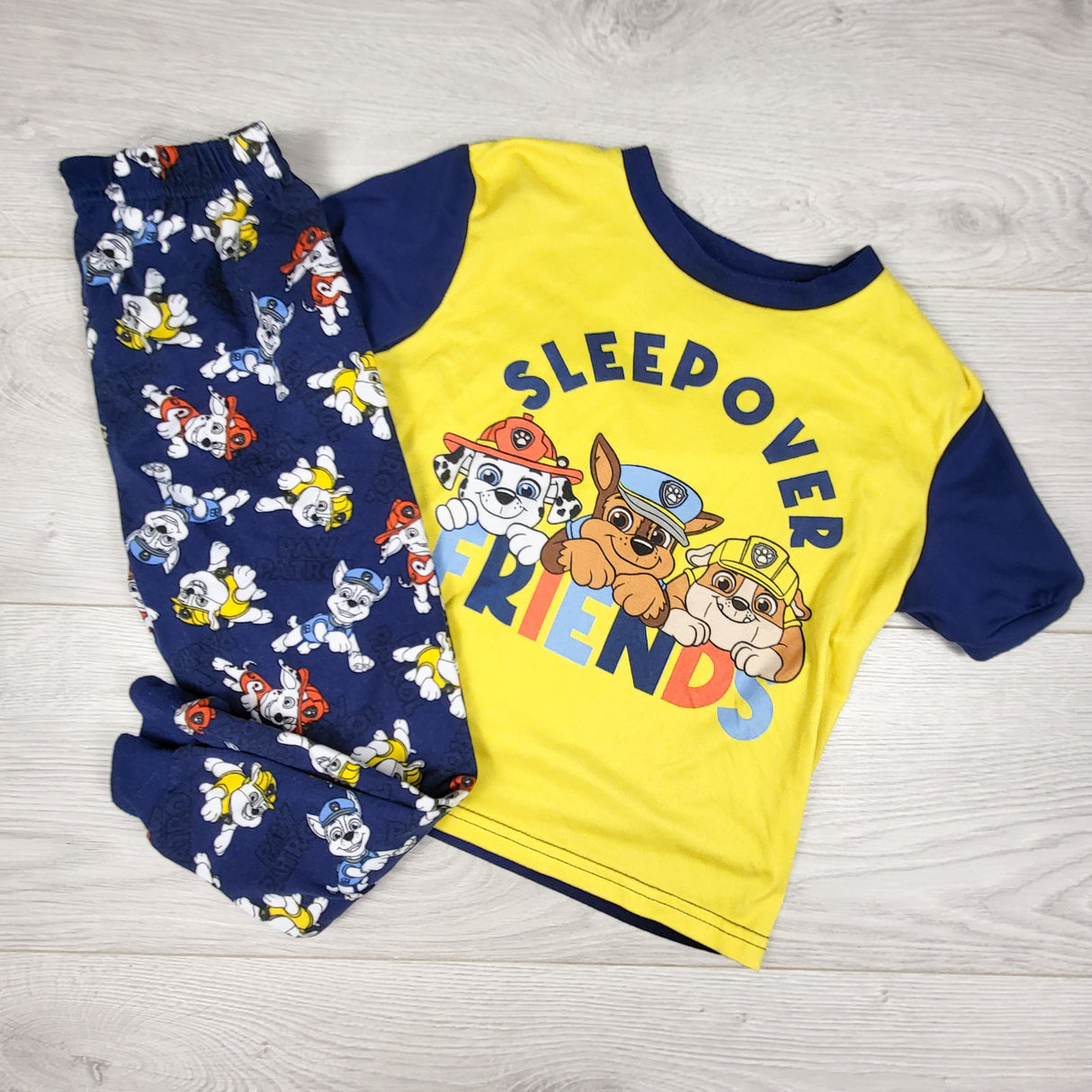 Paw Patrol yellow and navy 2pc PJs. Size 4T