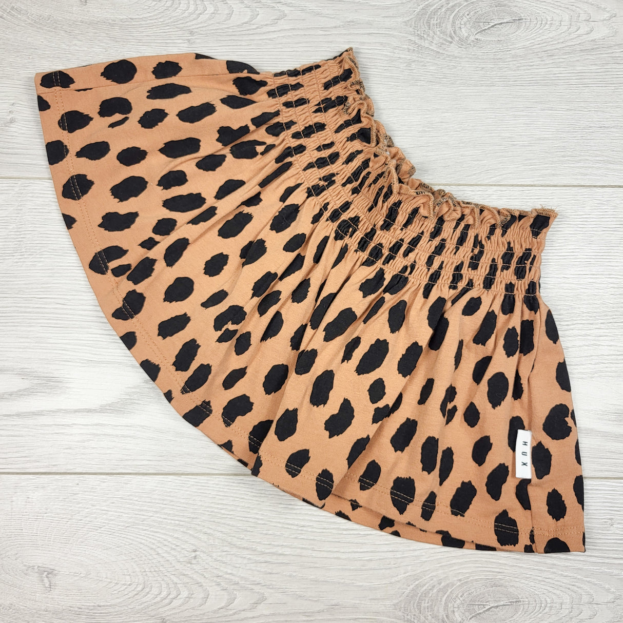 Hux Baby tan leopard print skirt. Size 2T