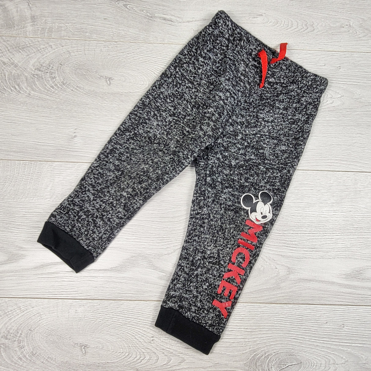 Disney black heathered knit Mickey Mouse pants. Size 12-18 months