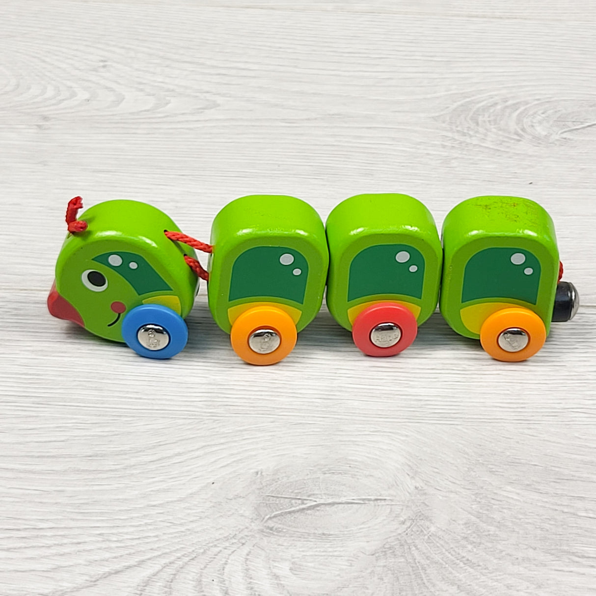 Hape wooden caterpillar train