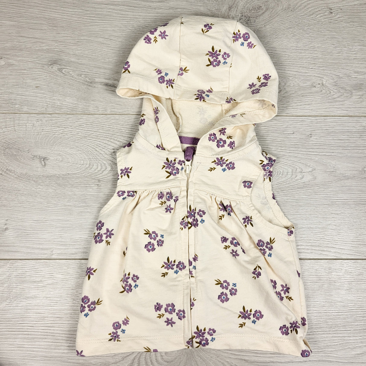 Carters cream coloured floral print sleeveless hoodie. Size 6 months