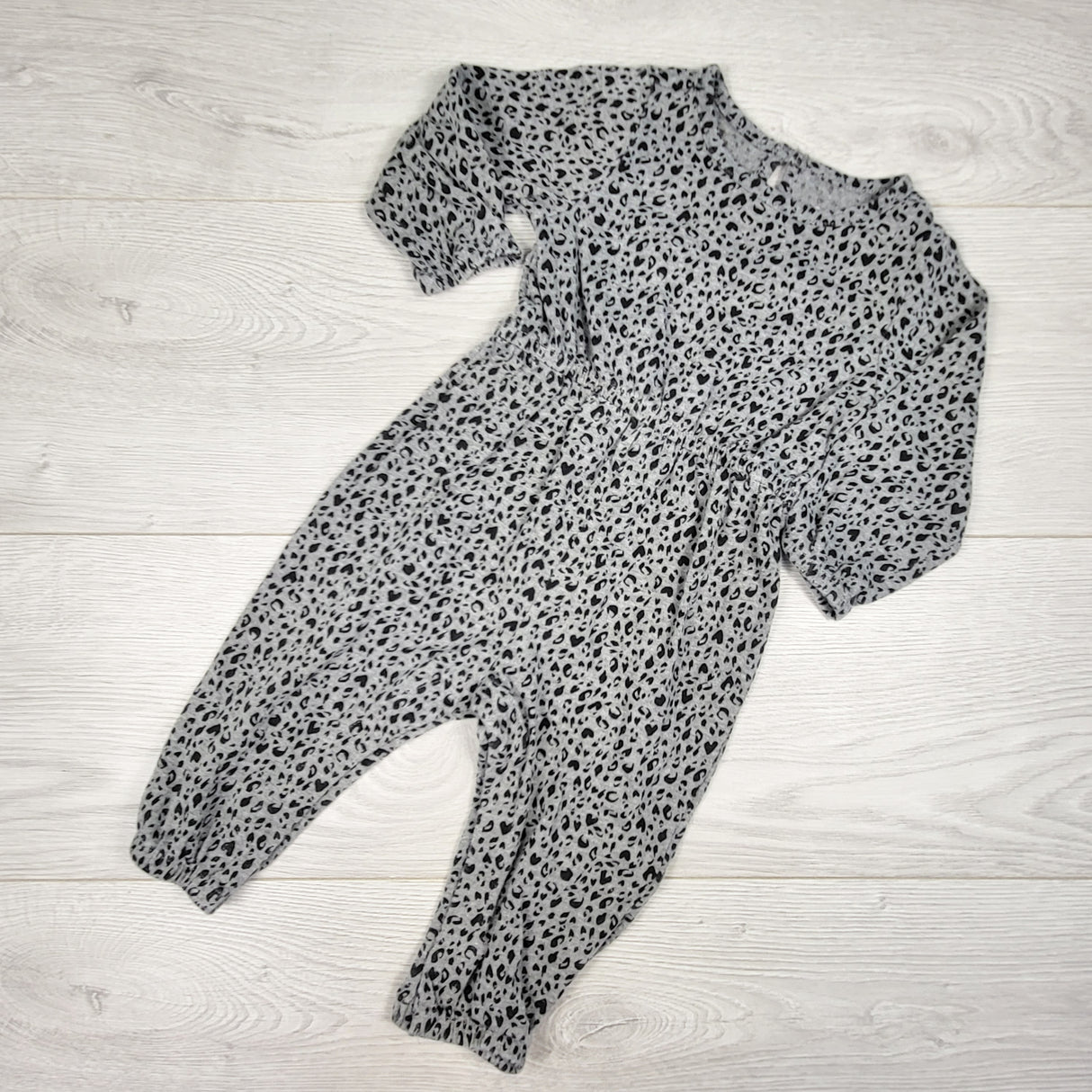 Old Navy grey leopard print romper. Size 6-12 months