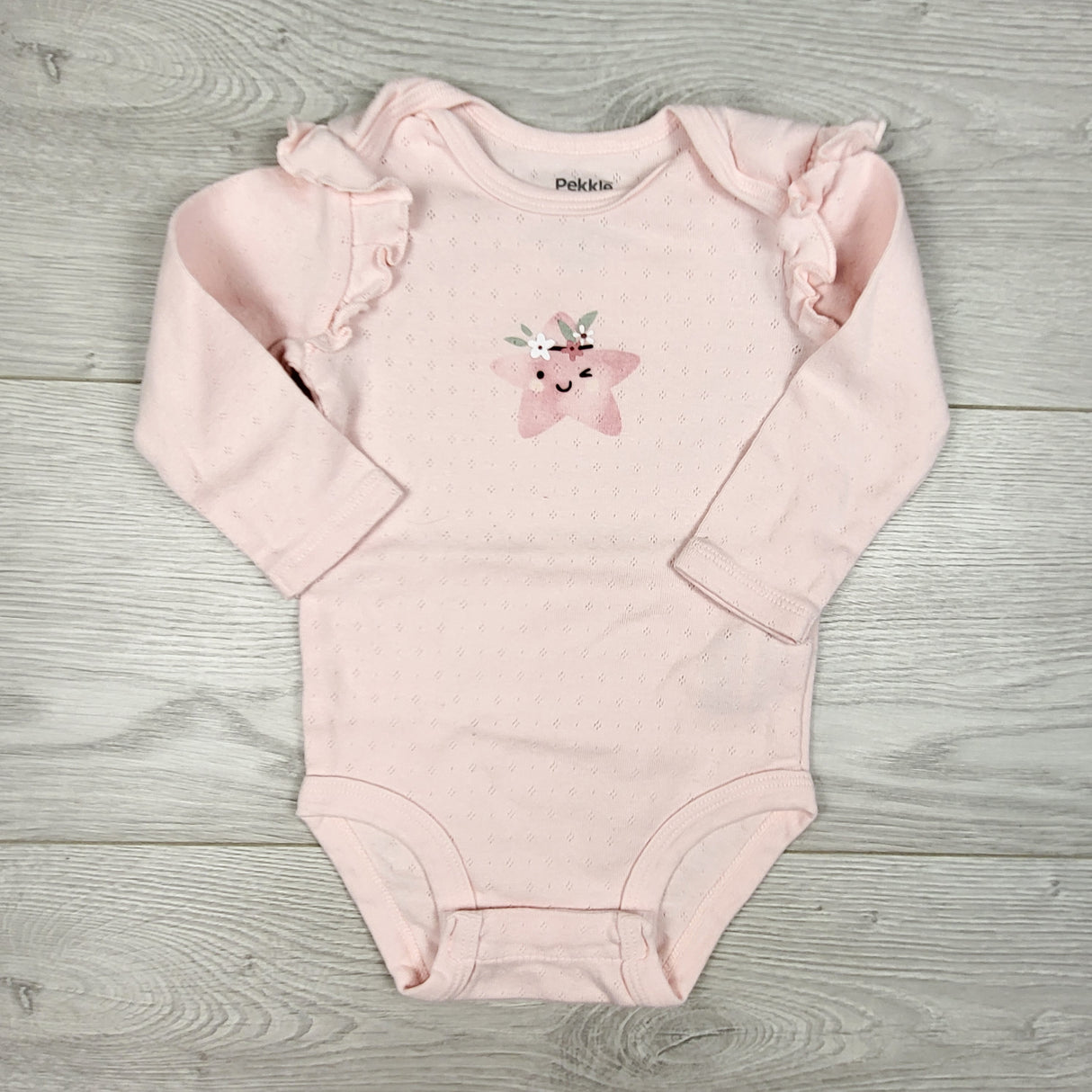 Pekkle pink pointelle bodysuit with star. Size 6 months