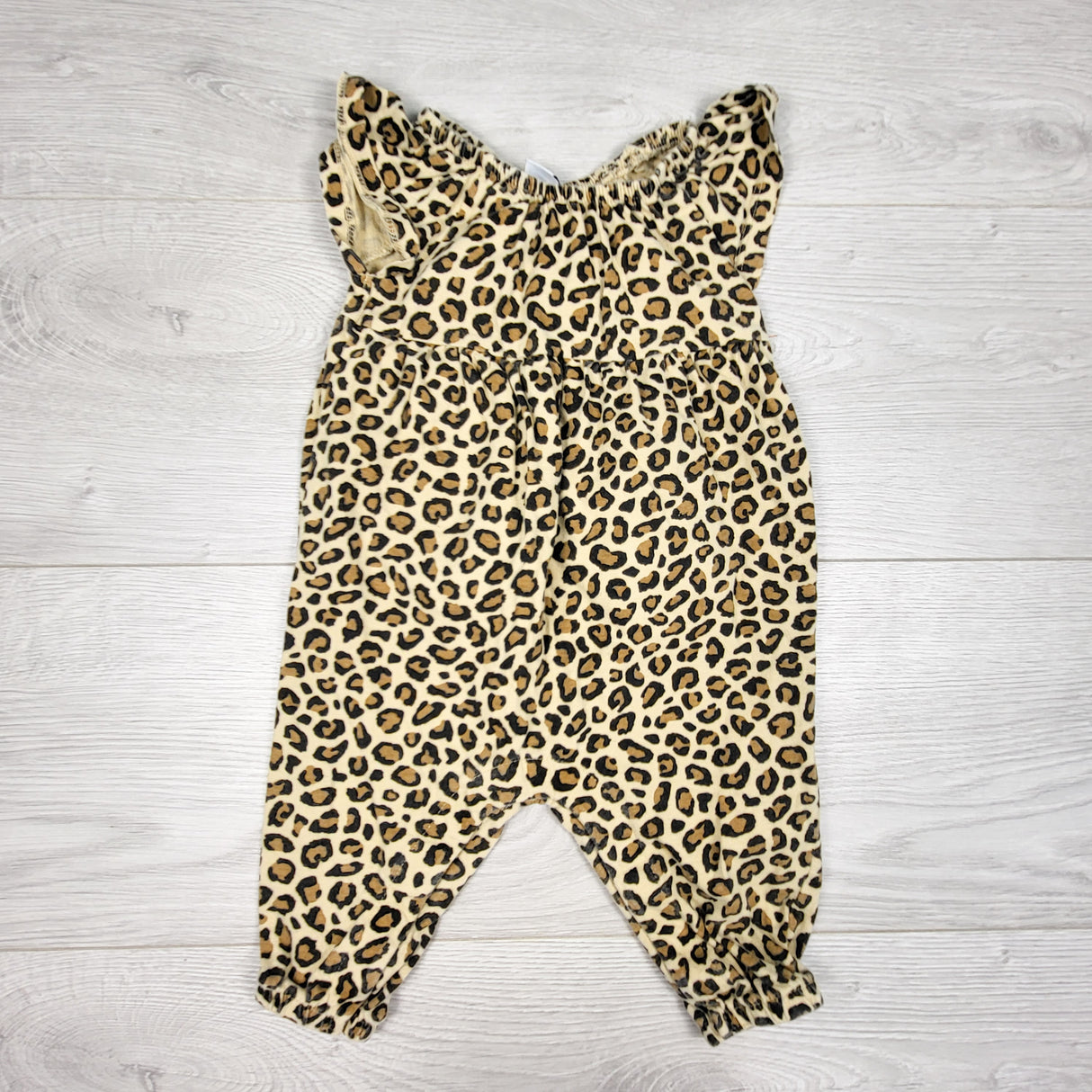 Old Navy tan leopard print romper. Size 3-6 months
