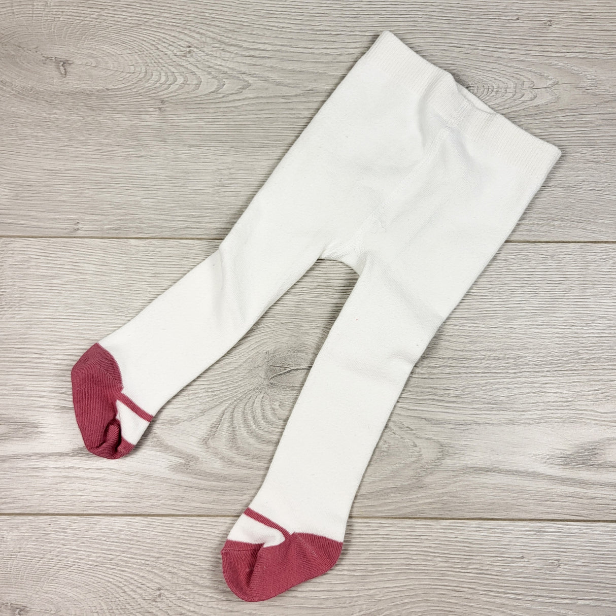 Carters white and pink tights. Size 6 months