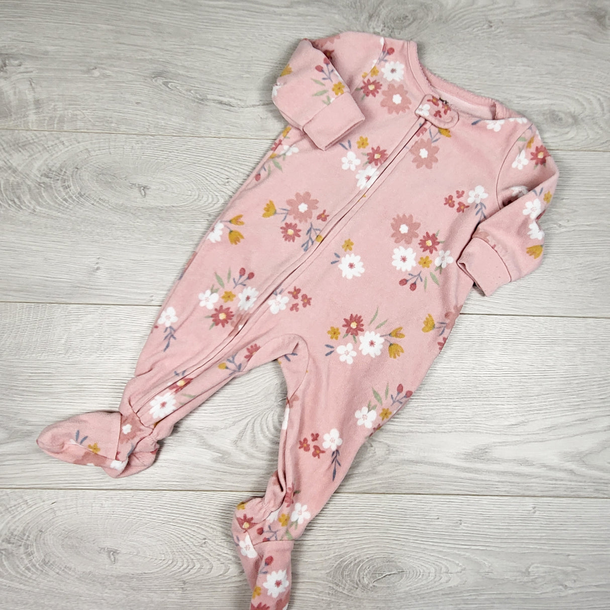 Carters pink floral print zippered fleece sleeper. Size 6 months