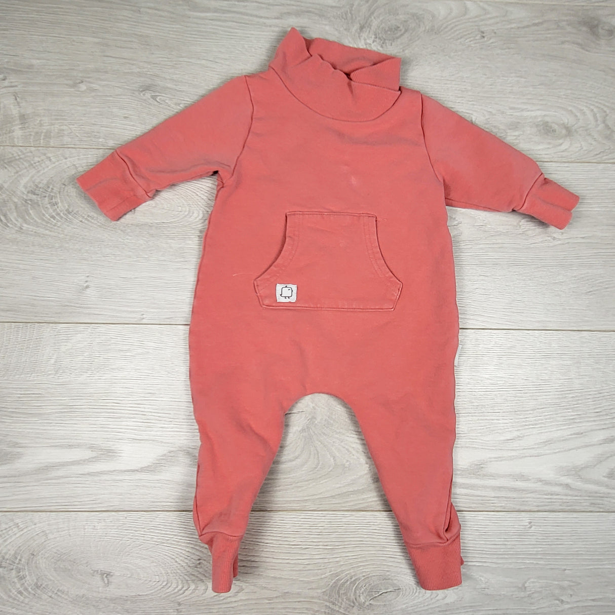 Huro Kids pink romper (full leg to leg zipper.) Size 3-6 months