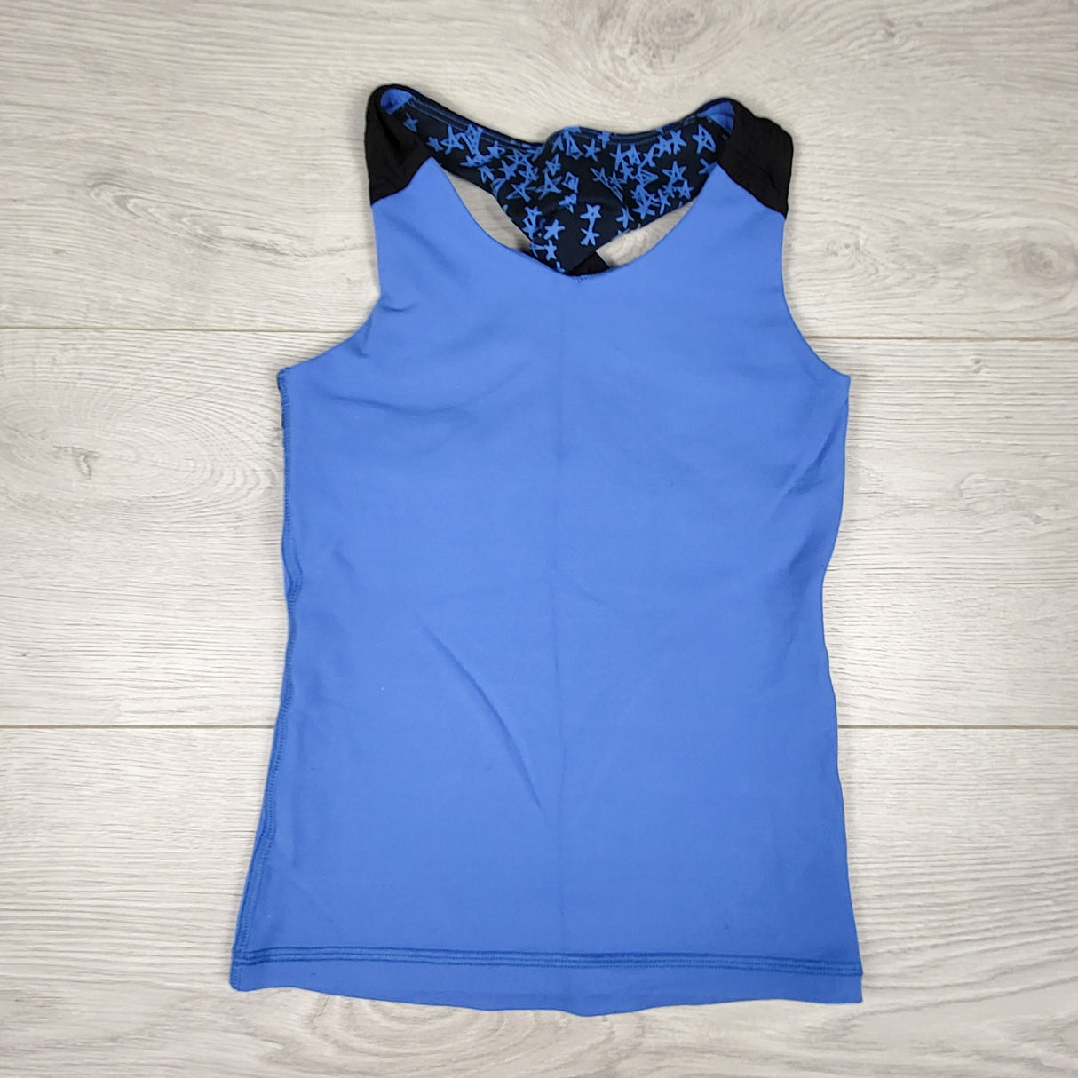 Ivivva (Lululemon) blue and black racerback tank top. Size 6