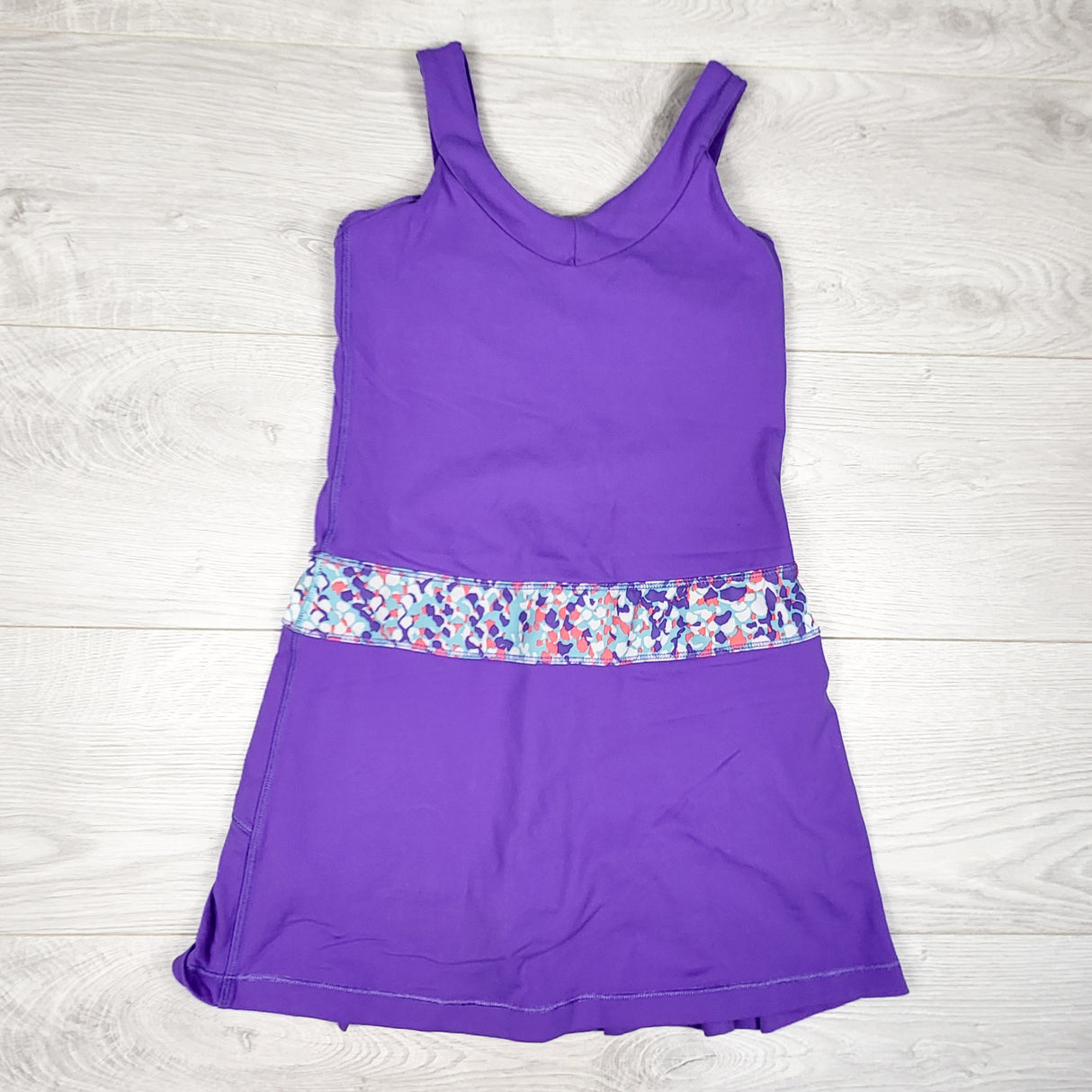 Ivivva (Lululemon) purple "Shake It Up" tennis dress with built in shorts. Size 10