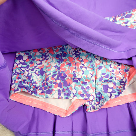 Ivivva (Lululemon) purple "Shake It Up" tennis dress with built in shorts. Size 10