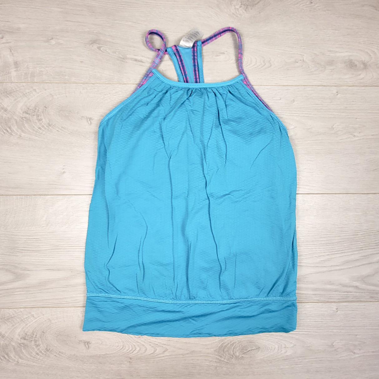 Ivivva (Lululemon) blue double dutch tank with built in sports bra. Size 10
