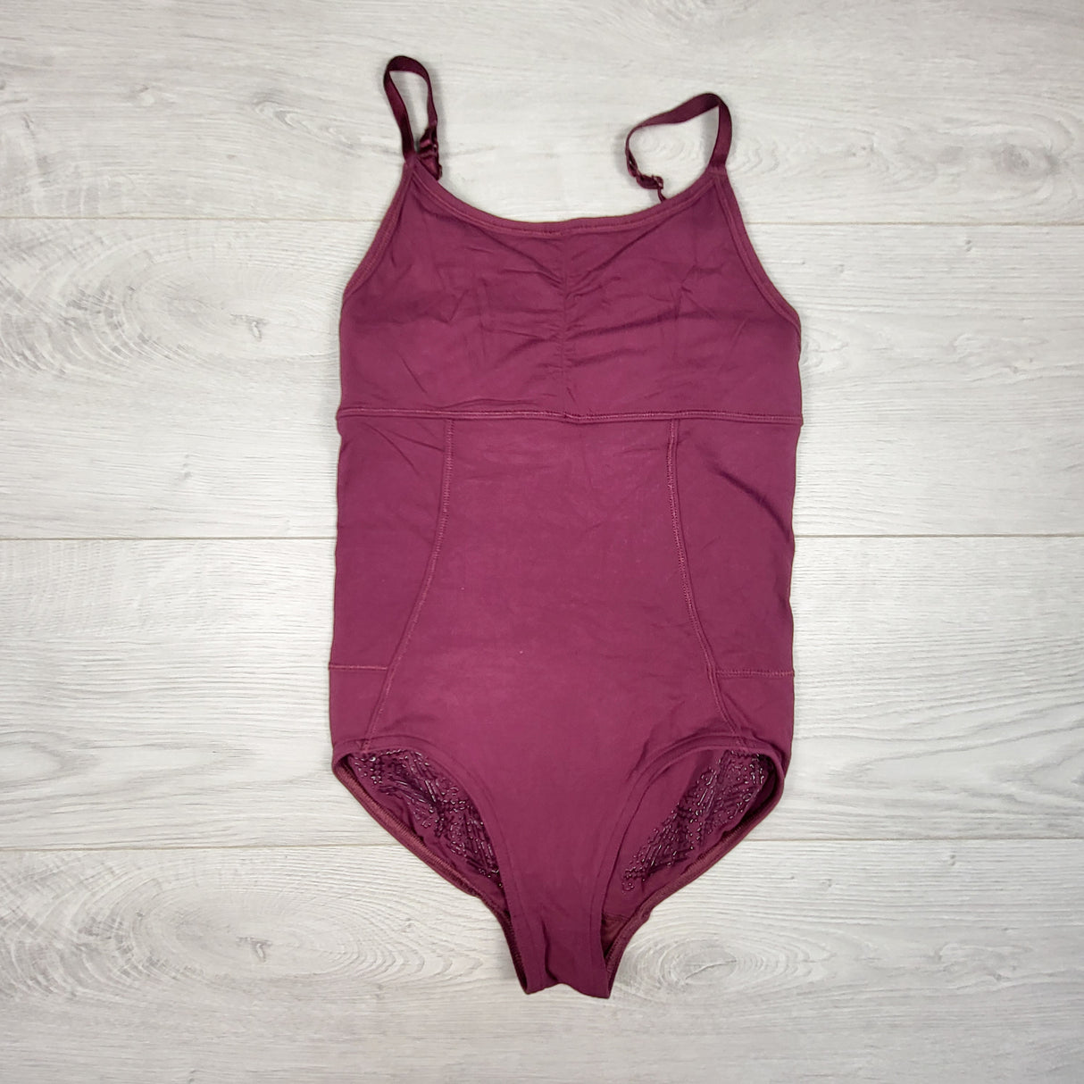 Ivivva (Lululemon) plum coloured "Pulse on Pointe" leotard. Size 10