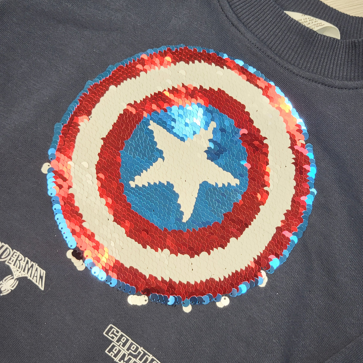 H and M navy Marvel sweatshirt with flip sequins. Size 3/4T