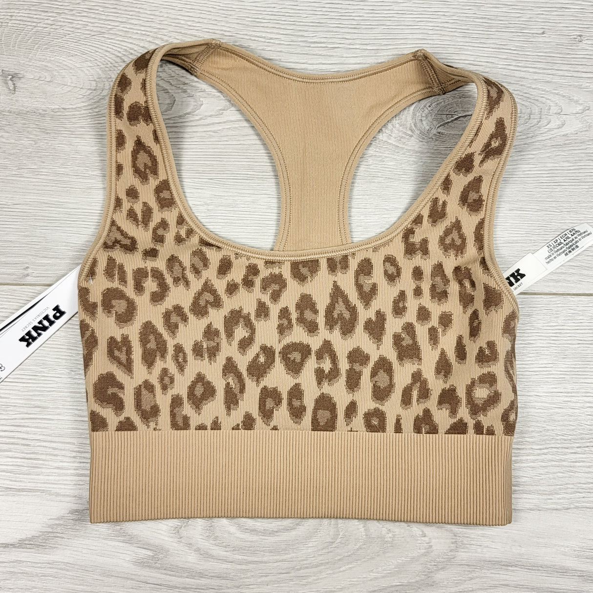 NEW - Victoria's Secret Pink leopard print sports bra. ADULT size XS