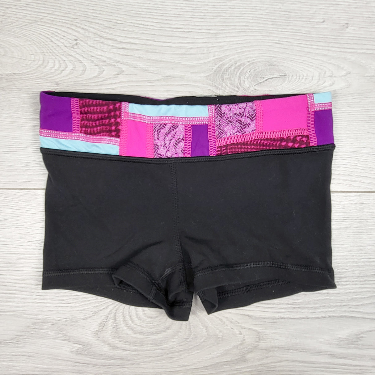 Ivivva (Lululemon) black reversible active bike shorts. Size 6