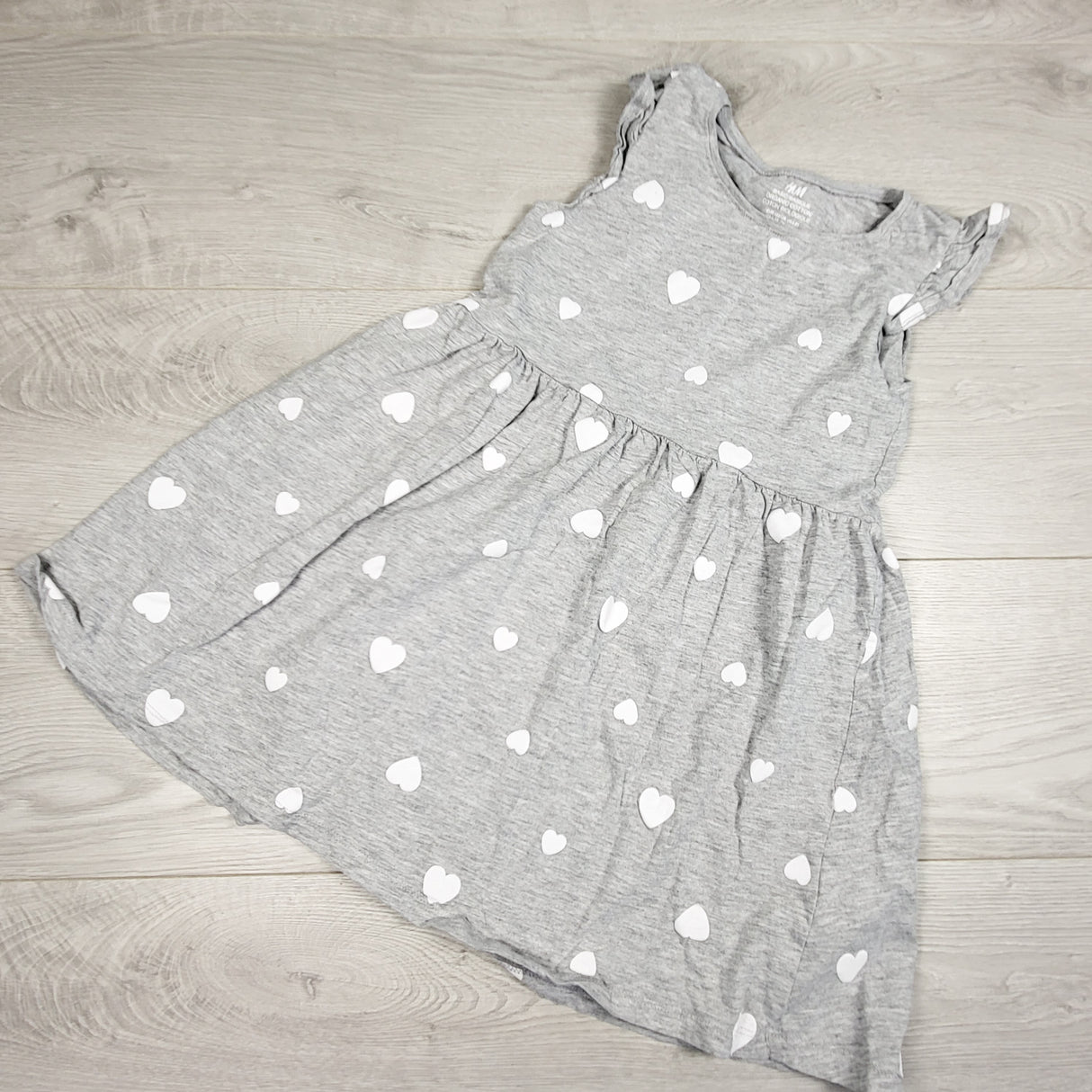 H and M grey organic cotton dress with hearts. Size 6-8 Years